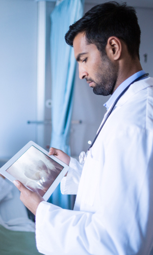 Doctor using a medical tablet pc