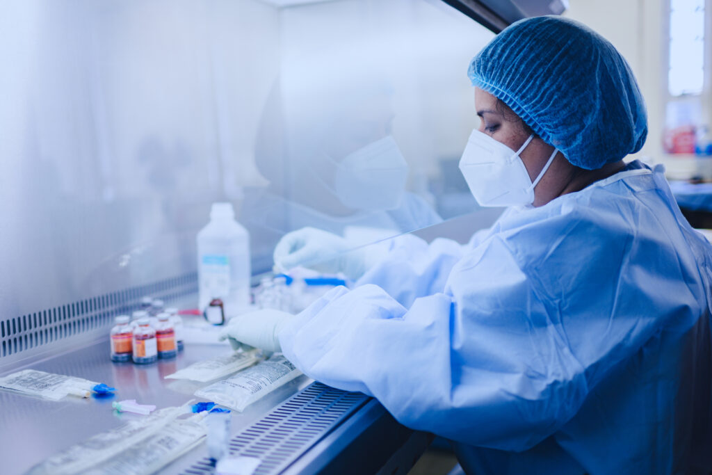 Pharmacist Preparing Chemotherapy Medicine in a Hospital Sterile Environment