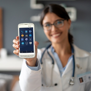 Healthcare professional holds up a medical rugged handheld smart device