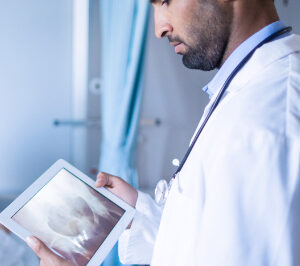 Doctor using a medical tablet pc