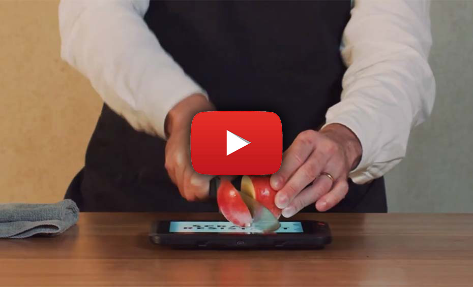 Thumbnail of a video showing TEGUAR's TRT-Q5393-07 being used as a cutting board for chopping an apple