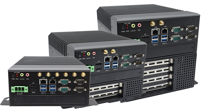 Three rugged AI platform PCs, which are black box PCs, staged beside one another. In front is the shortest one with IOs facing the viewer. To its left and angled slightly to the side is the same device elevated on top of two added PCIe slots. To the left and behind of that is one with four total slots, taller than the first two.