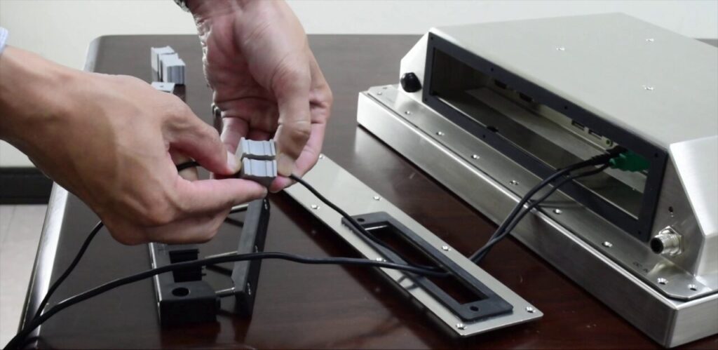 Putting cables through cable gland