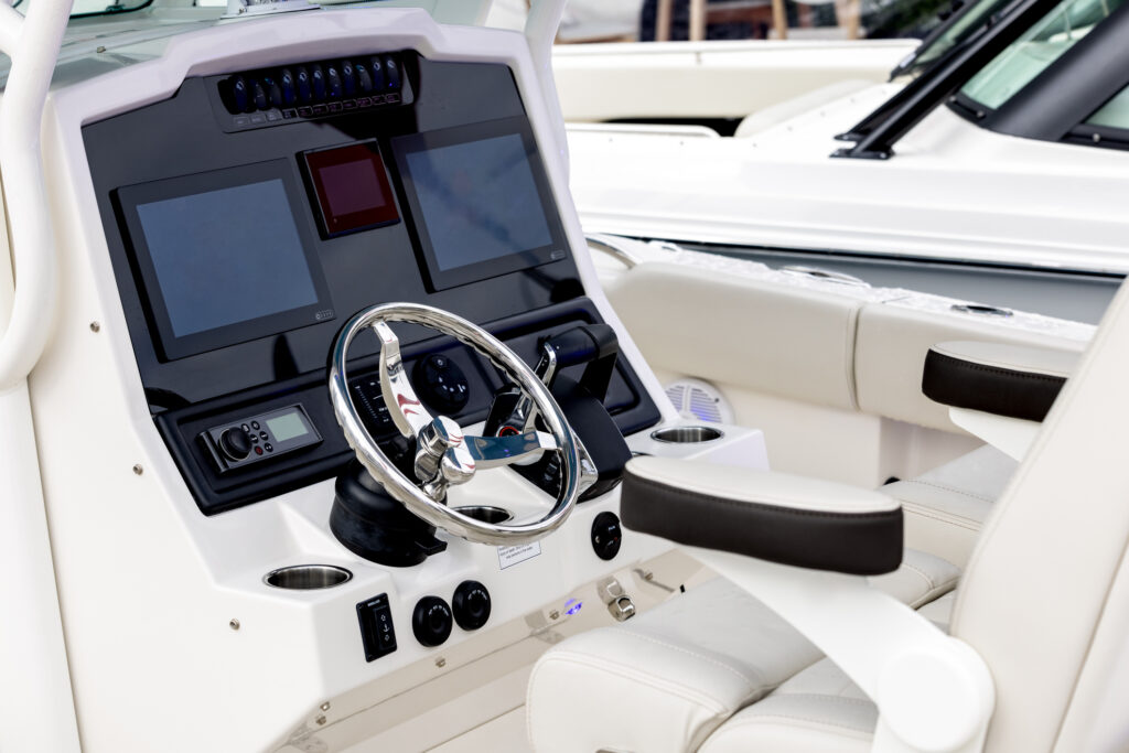 Steering wheel and control panel on luxury motorboat